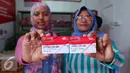 KKS disinergikan dengan sistem pembayaran elektronik yang disediakan bank plat merah, Jakarta, Kamis (18/8). Fasilitas layanan KKS mencakup menabung, penarikan tunai hingga menarik bantuan sosial yang diberikan Pemerintah. (Liputan6.com/Angga Yuniar)