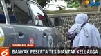 Peserta yang membawa bayi harus membagi konsentrasi antara ujian dan menyusui.