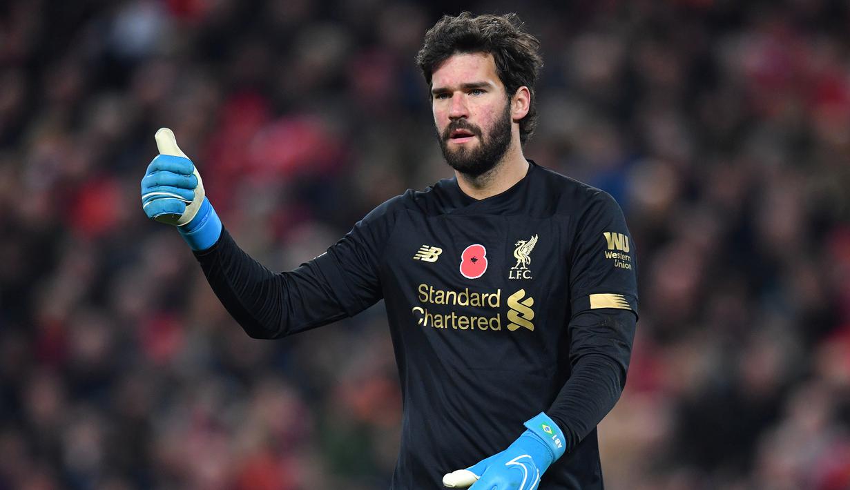 7. Alisson Becker - Liverpool : 67 Voting. (AFP/Paul Ellis)