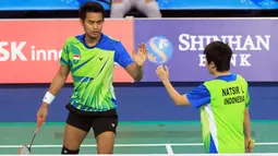 Pebulutangkis Ganda Campuran Indonesia, Tontowi Ahmad dan Liliyana Natsir, harus mengakui keunggulan Zhang Nan/Zhao Yunlei (Tiongkok) 16-21, 14-21 di Gyeyang Gymnasium, Incheon, Korea Selatan, (29/9/2014). (Dok Humas PBSI/Nafielah)