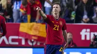 Selebrasi striker Timnas Spanyol, Dani Olmo setelah menjebol gawang Norwegia pada laga Grup A kualifikasi Euro 2024 di La Rosaleda Stadium, Malaga, Spanyol (25/3/2023). Dani Olmo melakukan debut bersama Timnas Spanyol pada laga kualifikasi Euro 2020 menghadapi Malta (15/11/2019). Tampil selama 24 menit sebagai pemain pengganti, ia menyumbang satu gol penutup ke gawang Malta dalam kemenangan 7-0. (AP Photo/Manu Fernandez)