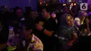 Kini, penggemar penyanyi kelahiran Surakarta, 52 tahun silam ini tidak lagi terbatas. Hampir dalam setiap penampilan Didi Kempot, penonton dari kalangan milenial memadati area dan bergoyang bersama seirama alunan musik campursari. (Liputan6.com/Herman Zakharia)