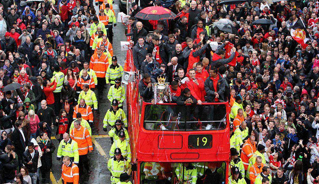 Pada tahun 2011, MU berhasil melangkahi koleksi gelar Liverpool. Saat itu Setan Merah meraih gelar mereka yang ke-19, sementara The Reds masih tertahan dengan koleksi 18 gelarnya. (AFP/Michael Jones)