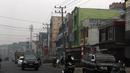 Sejumlah daerah di Provinsi Sumatera Selatan pada saat ini masih dilanda kabut asap dengan jarak pandang dan kadar partikel debu udara diambang batas normal, (14/10/14). (Liputan6.com/Faizal Fanani)