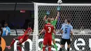 Gelandang Timnas Kanada, Ismael Kone (kiri) mencetak gol penyeimbang 1-1 ke gawang Timnas Uruguay pada laga perebutan tempat ketiga Copa America 2024 di Bank of America Stadium, Charlotte, Amerika Serikat, Minggu (14/7/2024) pagi WIB. (AP Photo/Nell Redmond)