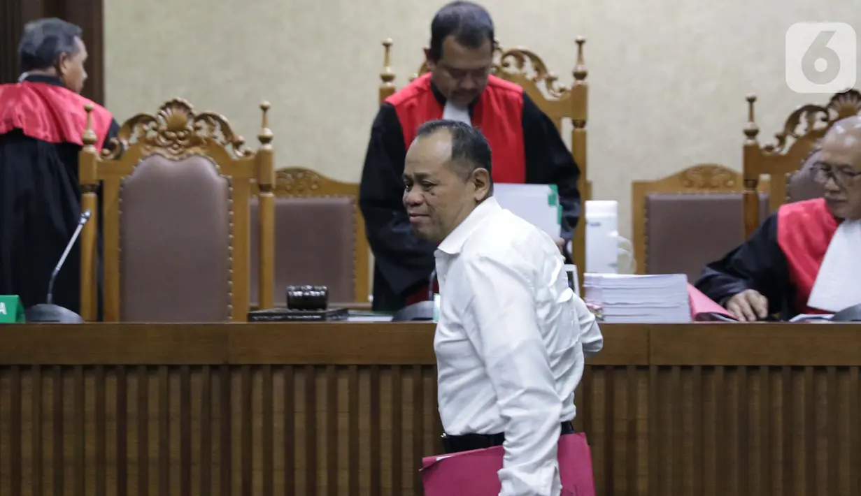 Terdakwa kasus dugaan kepemilikan senjata api illegal, Habil Marati usai menjalani sidang lanjutan di Pengadilan Negeri Jakarta Pusat, Kamis (3/10/2019). Sidang beragendakan pembacaan eksepsi yang dibacakan terdakwa dan penasehat hokum terdakwa. (Liputan6.com/Helmi Fithriansyah)