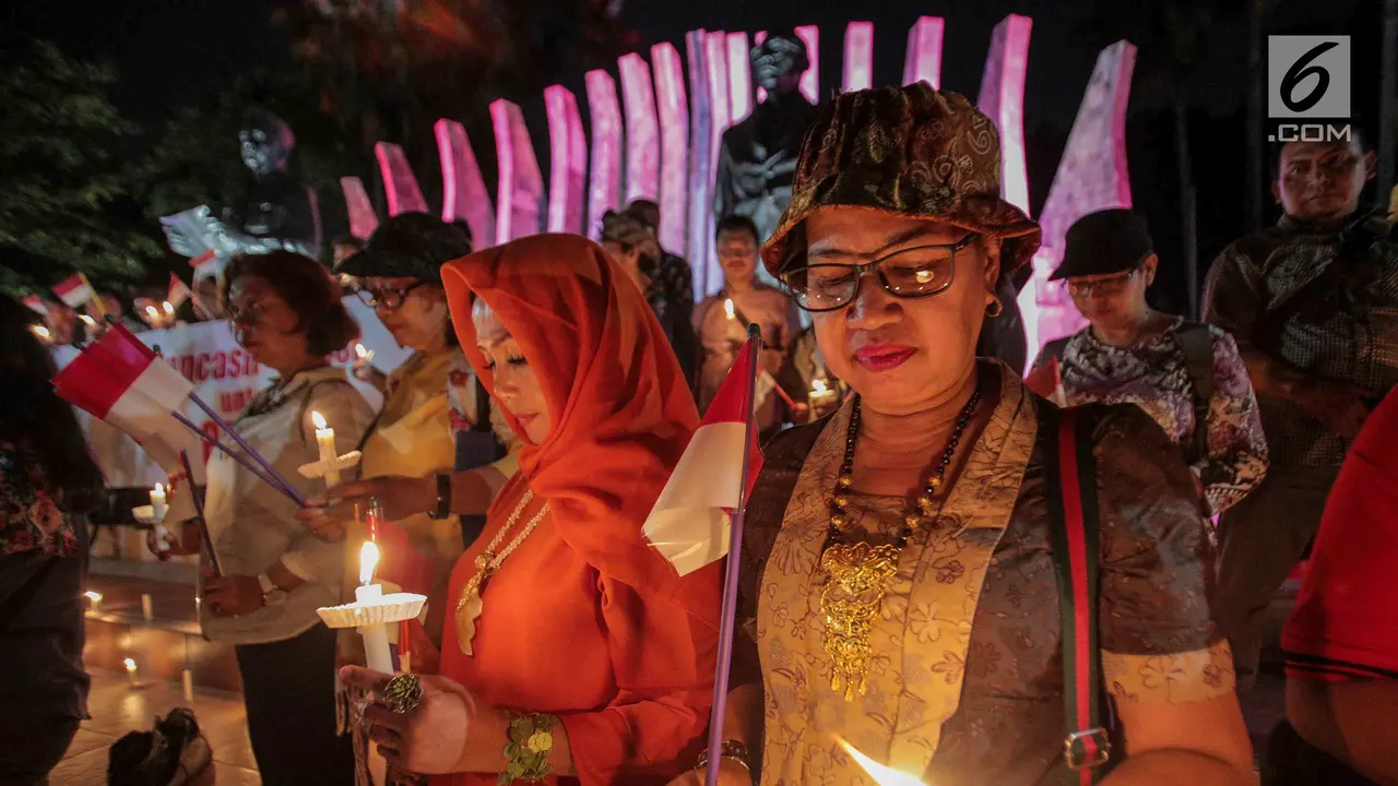 Massa Aksi Gelar Doa Bersama Serukan Perdamaian di Tanah Papua