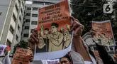 Sejumlah Guru Pendidikan Agama Islam (GPAI) melakukan aksi damai di depan gedung Kementerian Agama, Jakarta, Selasa (15/7/2025). (Liputan6.com/Herman Zakharia)