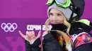 Senyum Silje Norendal saat final Women Snowboard Slopestyle pada rangkaian Olimpiade Musim Dingin di Rosa Khutor Extreme Park, Rusia, Minggu (9/2/2014). (AFP/Javier Soriano)