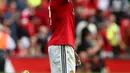 Penyerang MU, Romelu Lukaku melakukan selebrasi usai mencetak gol kedua ke gawang West Ham United pada pertandingan Liga Inggris di Old Trafford, Manchester, Inggris, (13/8). Lukaku mencetak dua gol di pertandingan ini. (AP Photo/Dave Thompson)