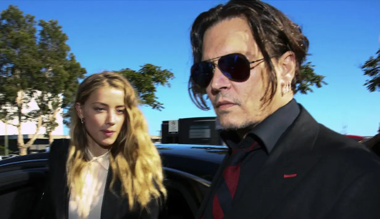Dalam proses cerainya kemarin, tersiar kabar Ambber Heard berusaha untuk terus menundanya lantaran berusaha mendapatkan nominal uang lebih besar dari Johnny Depp. (AFP/Bintang.com)