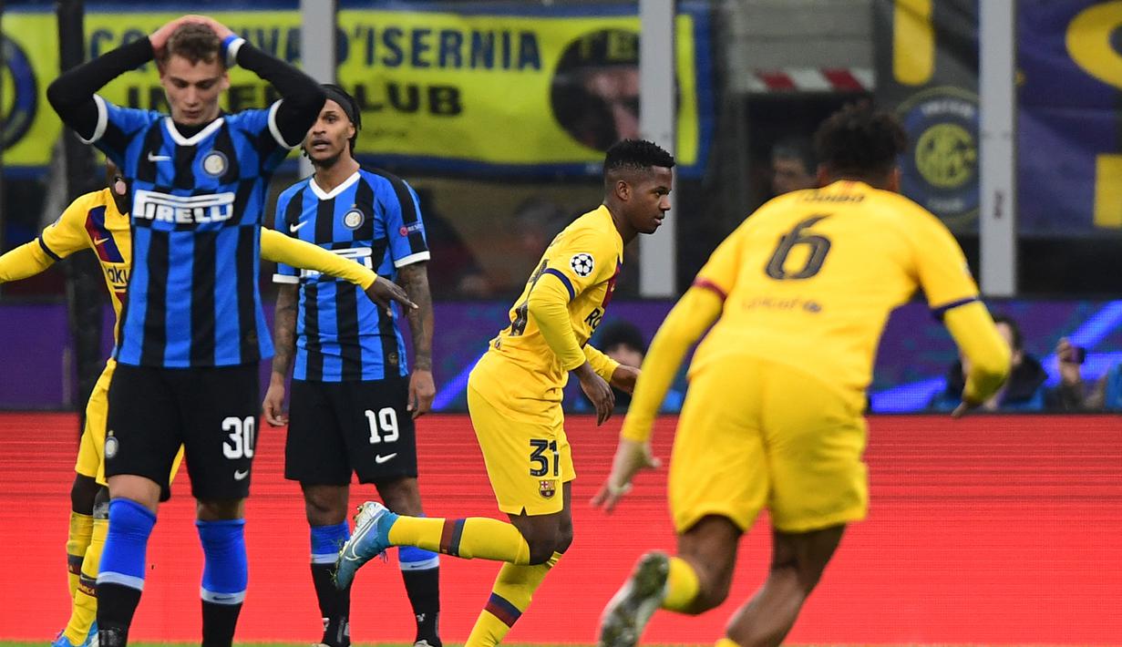 Ansu Fati (Barcelona). Menempati posisi pertama sebagai pemain termuda yang mencetak gol dalam laga Liga Champions saat berusia 17 tahun 40 hari ketika Barcelona menghadapi Inter Milan di San Siro, 10 Desember 2019. Hasil akhir, Barcelona menang 2-1. (AFP/Miguel Medina)