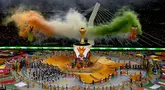 Kemeriahan pesta pembukaan Piala Afrika 2023 yang berlangsung di Stadion Alassane Ouattara Olympic, Abidjan, Pantai Gading, Minggu (14/01/2024) dini hari WIB. (AP Photo/Sunday Alamba)