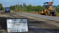 Jelang mudik, perbaikan jalan lintas barat Sumatera Dikebut. (Lipiutan6.com/Yuliardi Hardjo Putro)
