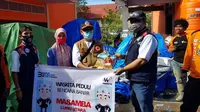 Pemberian bantuan PT Waskiyta Karya (Persero) kepada korban banjir bandang di Luwu Utara, Sulawesi Selatan (dok: Waskita)