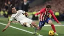 Hasil imbang melawan Atletico Madrid, tidak memengaruhi posisi Real Madrid di puncak klasemen Liga Spanyol dengan 58 poin. (Thomas COEX/AFP)