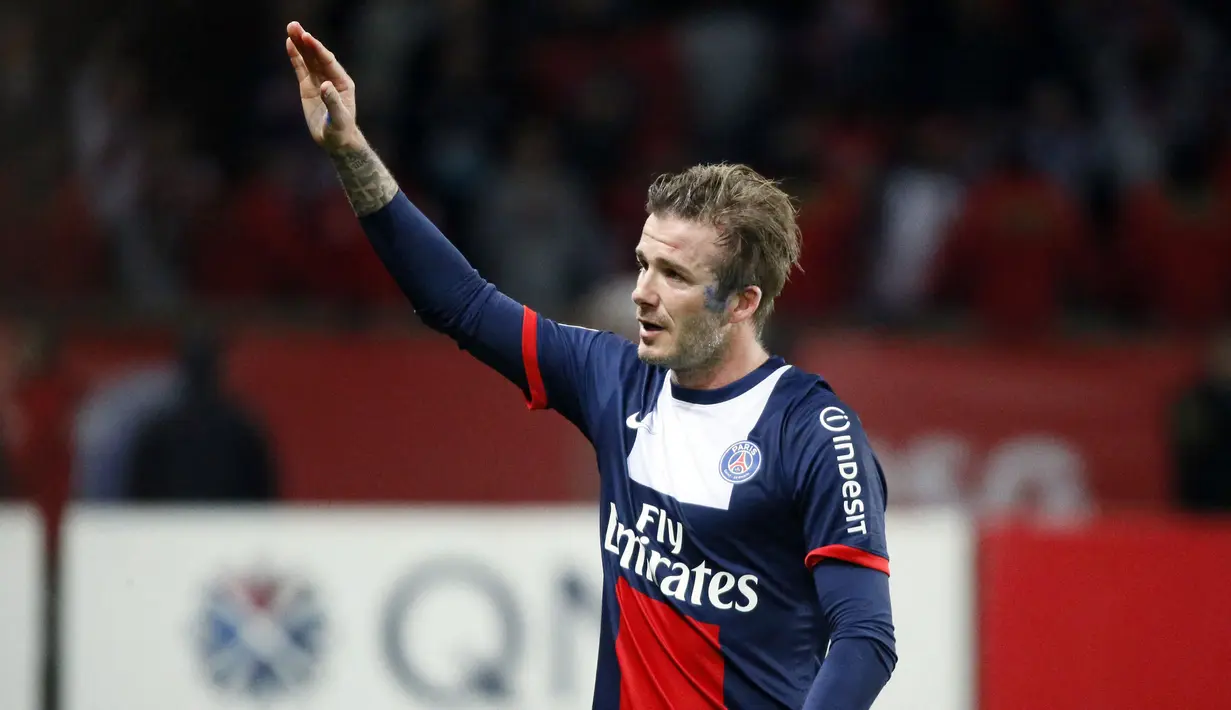 David Beckham adalah salah satu pemain awal yang membantu menempatkan Paris Saint-Germain di peta dunia walaupun penampilannya tak berdampak besar saat pertandingan. Menurut BBC, Beckham juga menyumbangkan gaji £ 1 juta untuk amal anak-anak setempat. (AFP/Kenzo Tribouillard)