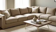 Desain ruang tamu kecil dengan Sofa L-Shaped. ©Ilustrasi MetaAI