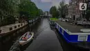 Karena banyaknya kanal tersebut, Amsterdam menjadi salah satu kota yang memiliki air paling banyak. (merdeka.com/Arie Basuki)