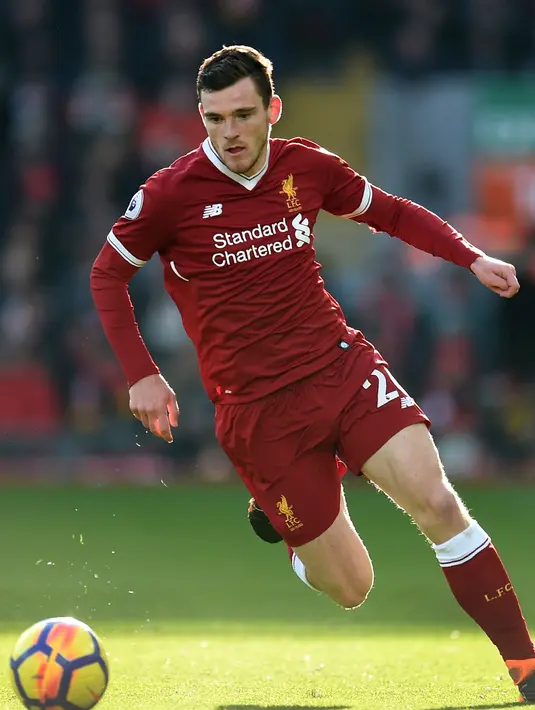 1. Andrew Robertson - Digaetnya pemain berkebangsaan Skotlandia ini demi menjawab masalah lama yang diderita Liverpool di sektor bek kiri. Tidak seperti bek yang sudah sudah, Andrew tampil selalu sesuai dengan ekspektasi. (AFP/Oli Scarff)