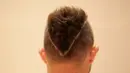 Potongan rambut mohawk ini menjadi ciri khas baru Ilija Spasojevic. (Bola.com/Vitalis Yogi Trisna)