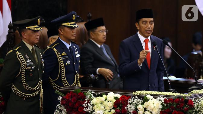 Joko Widodo atau Jokowi memberikan pidato perdana usai dilantik menjadi Presiden RI periode 2019-2024 di Gedung Nusantara, Jakarta, Minggu (20/10/2019). Jokowi dan Ma'ruf Amin resmi dilantik sebagai Presiden dan Wakil Presiden RI periode 2019-2024. (Liputan6.com/JohanTallo)