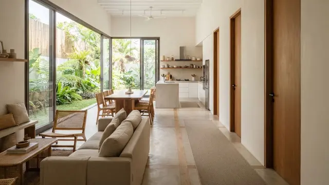 Desain Rumah Memanjang dengan Dapur Terbuka dan Pencahayaan Alami