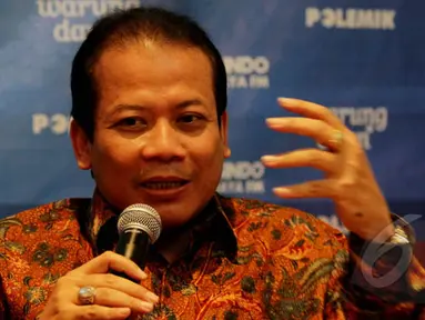 Wakil Ketua DPR RI Taufik Kurniawan berbicara saat diskusi polemik bertajuk 'Banyak Pilihan Untuk Jokowi' di Jakarta, Sabtu (7/2/2015). (Liputan6.com/Johan Tallo)