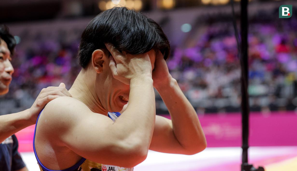 <p>Ekspresi kecewa pesenam Jepang, Kazuki Minami setelah gagal tampil sempurna pada nomor senam lantai final aparatus putra Kejuaraan Dunia Gimnastik 2025 di Indonesia Arena, Senayan, Jakarta, Jumat (24/10/2025). (Bola.com/Bagaskara Lazuardi)</p>