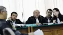 Jaksa mempertanyakan adanya KK atas nama Akil sebagai kepala rumah tangga dan Dwiyana sebagai istri. Jaksa mengatakan, dalam KK tersebut, mereka tertulis memiliki dua putra, Pengadilan Tipikor Jakarta, Kamis (5/6) (Liputan6.com/Faizal Fanani).