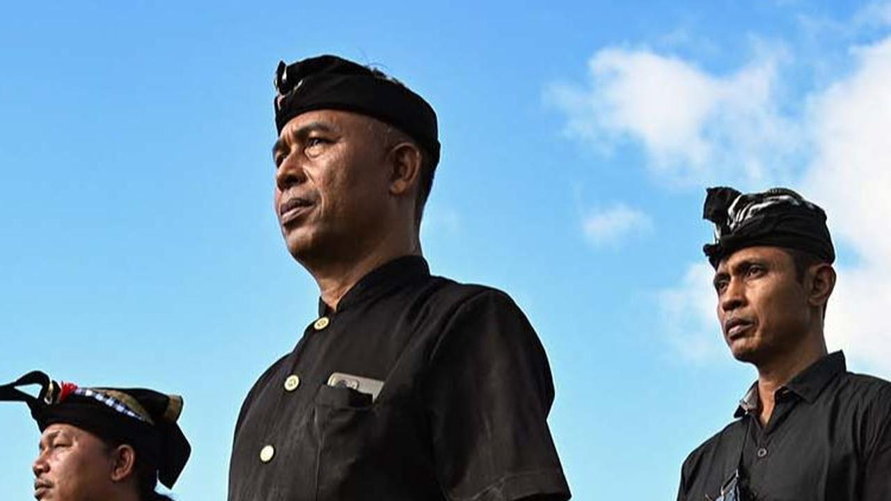 FOTO: Pasukan TNI, Polri, hingga Pecalang Dikerahkan untuk Amankan Libur Nataru di Bali