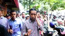 Calon presiden nomor urut 2, Joko Widodo menyambangi pasar Kebayoran Lama, Jakarta, Senin (30/6/14). (Liputan6.com/Andrian M Tunay)