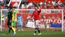 Pemain Manchester United Cristiano Ronaldo melakukan selebrasi usai mencetak gol ke gawang Norwich City pada pertandingan sepak bola Liga Inggris di Stadion Old Trafford, Manchester, Inggris 16 April 2022. Manchester United menang 3-2. (AP Photo/Jon Super)