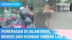 Beruntung penumpang mobil mengabadikan gelagat aneh pria ini. Sempat heboh berteriak jadi korban tabrakan dan lari hingga akhirnya pura-pura pincang di depan mobil, ternyata komplotan pemerasan di jalan.