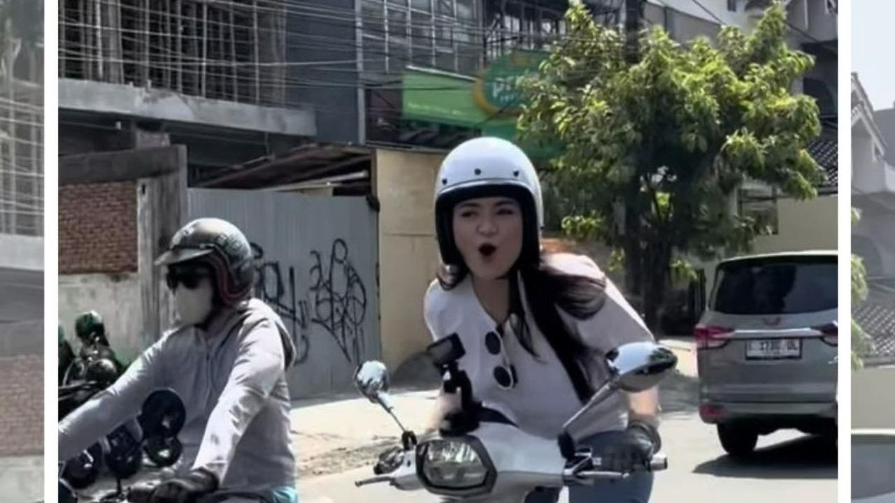 Berdiri di atas motor