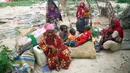 Kehidupan dari 1,6 juta orang di Somalia bisa terganggu oleh banjir selama musim hujan yang berlangsung hingga Desember, dengan 1,5 juga hektare tanah pertanian berpotensi ikut mengalami kerusakan, kata lembaga tersebut. (AP Photo/Farah Abdi Warsameh)