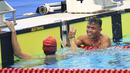 Atlet Indonesia Aris Wibawa berselebrasi usai menang pada babak final putra 100 meter gaya dada SB7 para renang Asian Para Games 2018 di Aquatic Center, GBK, Jakarta, Senin (8/10). Aris berhasil meraih perak dalam kelas tersebut. (Merdeka.com/Imam Buhori)