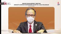 Ketua Dewan Komisioner Otoritas Jasa Keuangan (OJK) Mahendra Siregar dalam konferensi pers, Rabu (20/7/2022).