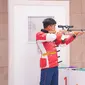 Petembak Indonesia&nbsp;Muhammad Sejahtera Dwi Putra meraih medali emas&nbsp; cabor menembak nomor Shooting-Mens 10m Running Target Asian Games 2023&nbsp;di Fuyang Yinhu Sports Centre China, Senin, 25 September 2023. (foto: NOC)