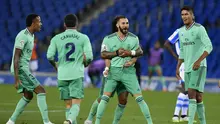 Striker Real Madrid Karim Benzema merayakan golnya ke gawang Real Sociedad dalam lanjutan Liga Spanyol di Stadion Anoeta, San Sebastian, Senin (22/6/2020) dini hari WIB. (AP Foto / Alvaro Barrientos)