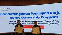 Foto bersama Direktur SDM dan Digital PT Avuasu Parawisata Indonesia (Persero) Herdy Harman dan Direktur Consumer Bank Tabungan Negara (Persero) Tbk BTN Hirwandi Gafar. (Foto: Dok.)