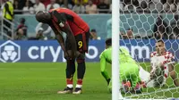 Reaksi kecewa pemain Belgia,&nbsp;Romelu Lukaku setelah gagal mencetak gol ke gawang Kroasia saat matchday ketiga Grup F Piala Dunia 2022 yang berlangsung di&nbsp;Ahmad Bin Ali Stadium, Kamis (01/12/2022). (AP/Francisco Seco)