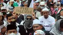 Aksi ini dihadiri oleh Ustaz Abdul Somad, Ustaz Zaitun Rasmin, Ustaz Bachtiar Nasir, Ustaz Abdullah Hakam Shah, dan Ustazah Nurjanah. (merdeka.com/Arie Basuki)