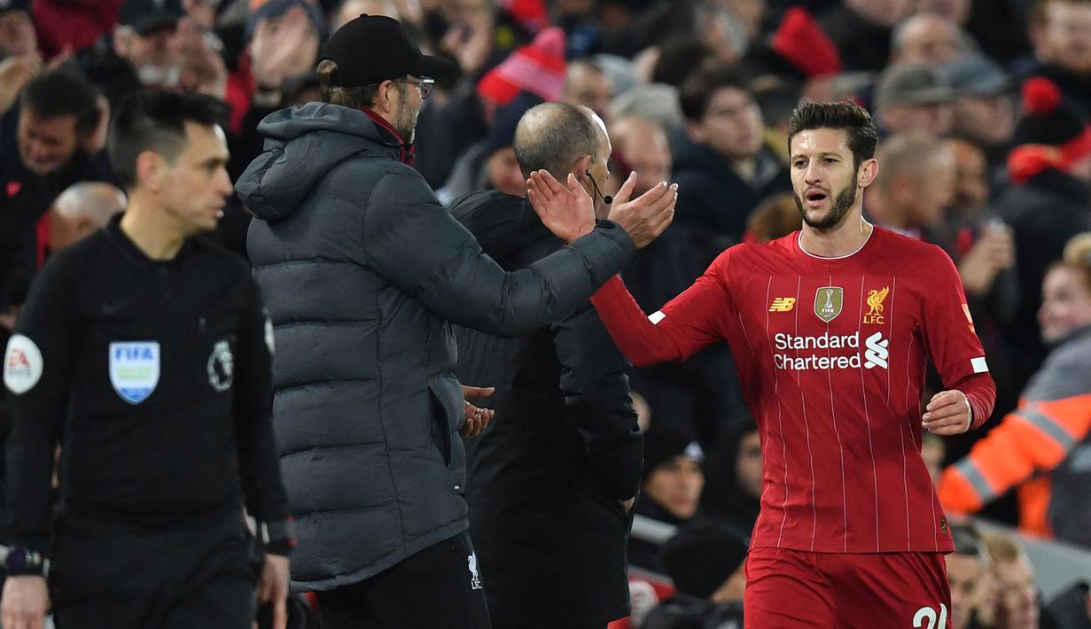 <p>Adam Lallana. Liverpool mendatangkan gelandang serang Inggris ini dari Southampton pada awal musim 2014/2015 dengan nilai transfer 31 juta euro. Pada awal musim 2020/2021 ia dilepas gratis ke Brighton and Hove Albion setelah total memperkuat The Reds selama 6 musim dan tampil dalam 178 laga di semua ajang dengan torehan 22 gol dan 22 assist. (AFP/Paul Ellis)</p>