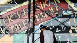 Suku Dinas Kebudayaan (Sudinbud) Jakarta Timur menggelar pelatihan seni mural. (Liputan6.com/Herman Zakharia)