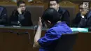 Terdakwa perintangan proses penyidikan KPK, Lucas saat menjalani sidang putusan di Pengadilan Tipikor, Jakarta, Rabu (20/3). Majelis Hakim menyebut Lucas terbukti bersalah merintangi penyidikan KPK atas kasus Eddy Sindoro.(Liputan6.com/Helmi Fithriansyah)
