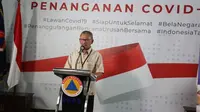 Juru Bicara Penanganan COVID-19 di Indonesia, Achmad Yurianto saat konferensi pers secara Live di Graha BNPB, Jakarta, Senin (30/3/2020).