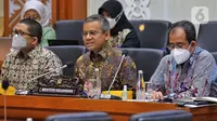 Wakil Menteri Keuangan (Wamenkeu) Suahasil Nazara mengikuti rapat kerja dengan Badan Legislasi DPR RI di kompleks Parlemen, Jakarta, Kamis (18/8/2022). Raker tersebut dalam rangka harmonisasi Rancangan Undang-Undang (RUU) tentang pengembangan dan penguatan sektor keuangan. (Liputan6.com/Angga Yuniar)