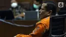 Irjen (Pol) Napoleon Bonaparte saat menjadi saksi dalam sidang lanjutan dugaan perantara suap penghapusan red notice Djoko Tjandra dengan terdakwa Tommy Sumardi di Pengadilan Tipikor, Jakarta, Selasa (24/11/2020). Sidang beragenda mendengar keterangan saksi. (Liputan6.com/Helmi Fithriansyah)