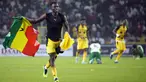 Pemain Ghana melakukan selebrasi pada akhir pertandingan leg kedua kualifikasi Piala Dunia 2022 melawan Nigeria di Stadion Moshood Abiola, Abuja, Nigeria, 29 Maret 2022. Ghana lolos ke Piala Dunia 2022 setelah unggul agregat gol tandang, skor akhir pertandingan ini 1-1. (AP Photo/Sunday Alamba)